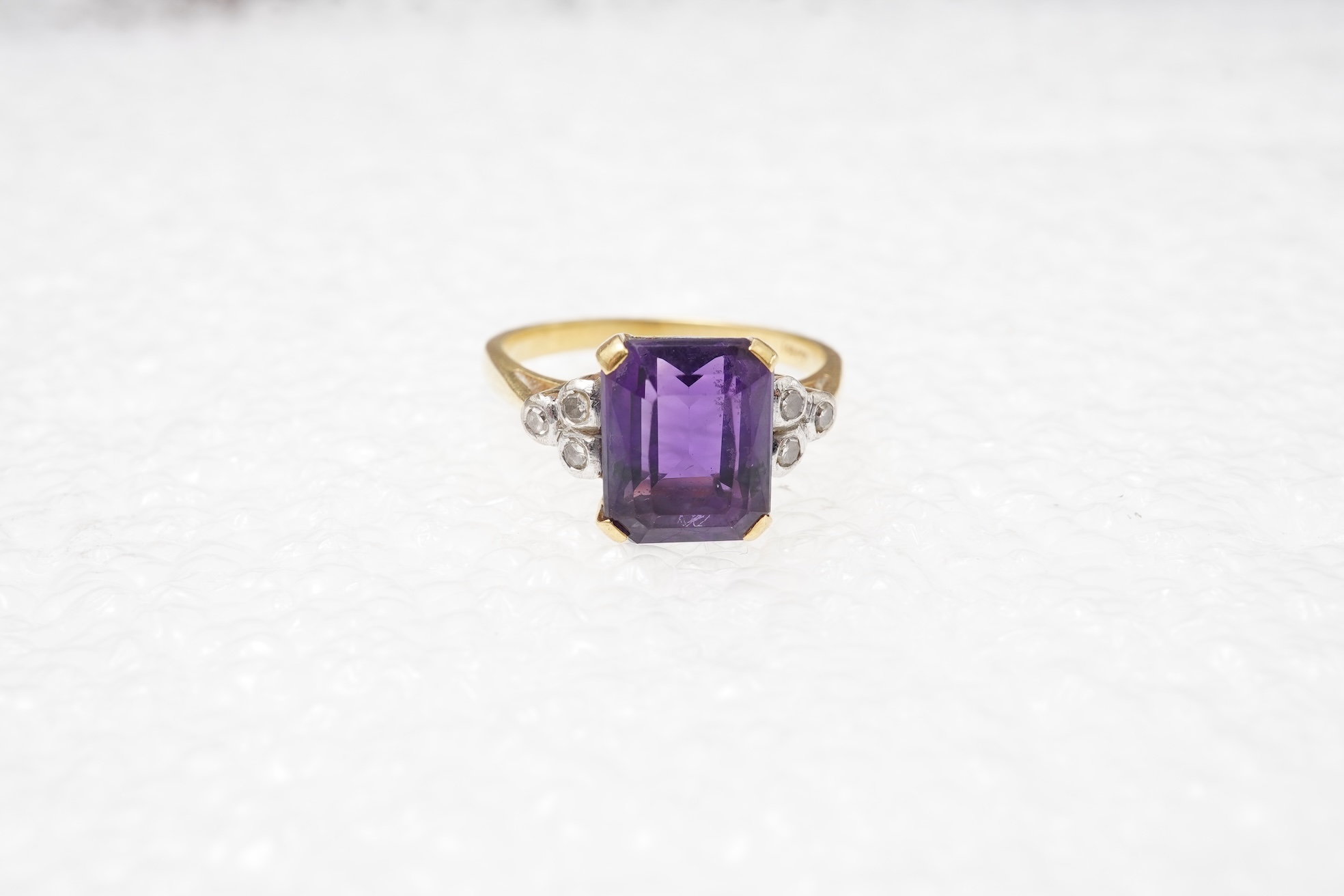 An amethyst and diamond ring